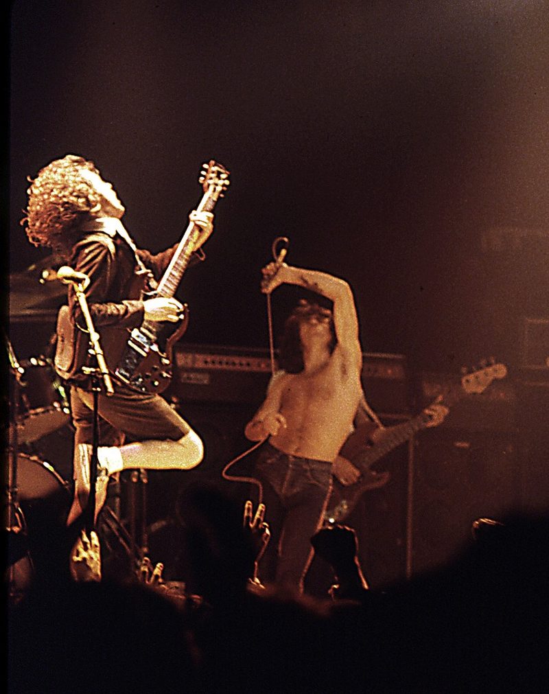 Angus Young (left) and Bon Scott on stage at the Ulster Hall, Belfast, in the late 1970s.