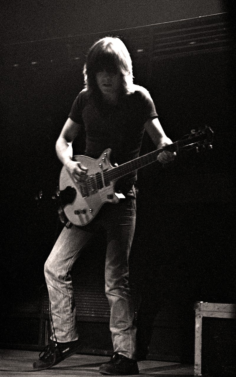 Malcolm Young playing rhythm guitar at the Manchester Apollo, England, 1982.