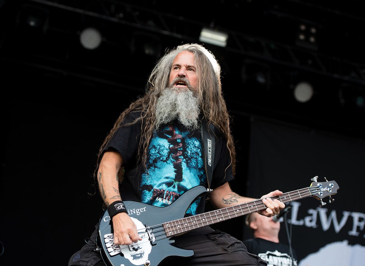 Clawfinger's bassist playing a band-branded bass at Hammaburg Fest, Hamburg, 16 August 2019.