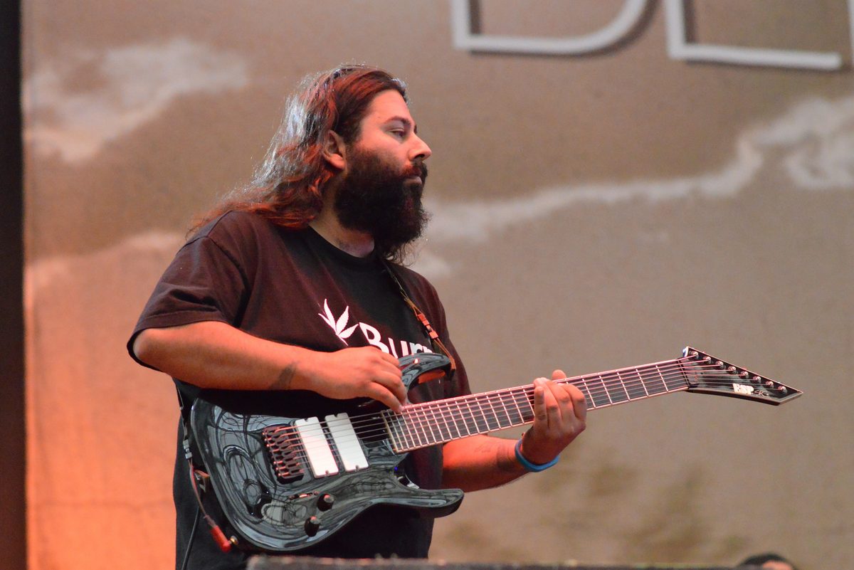 Stephen Carpenter playing an eight-string ESP signature guitar with Deftones at the Rock im Pott festival, Germany, 18 August 2013.