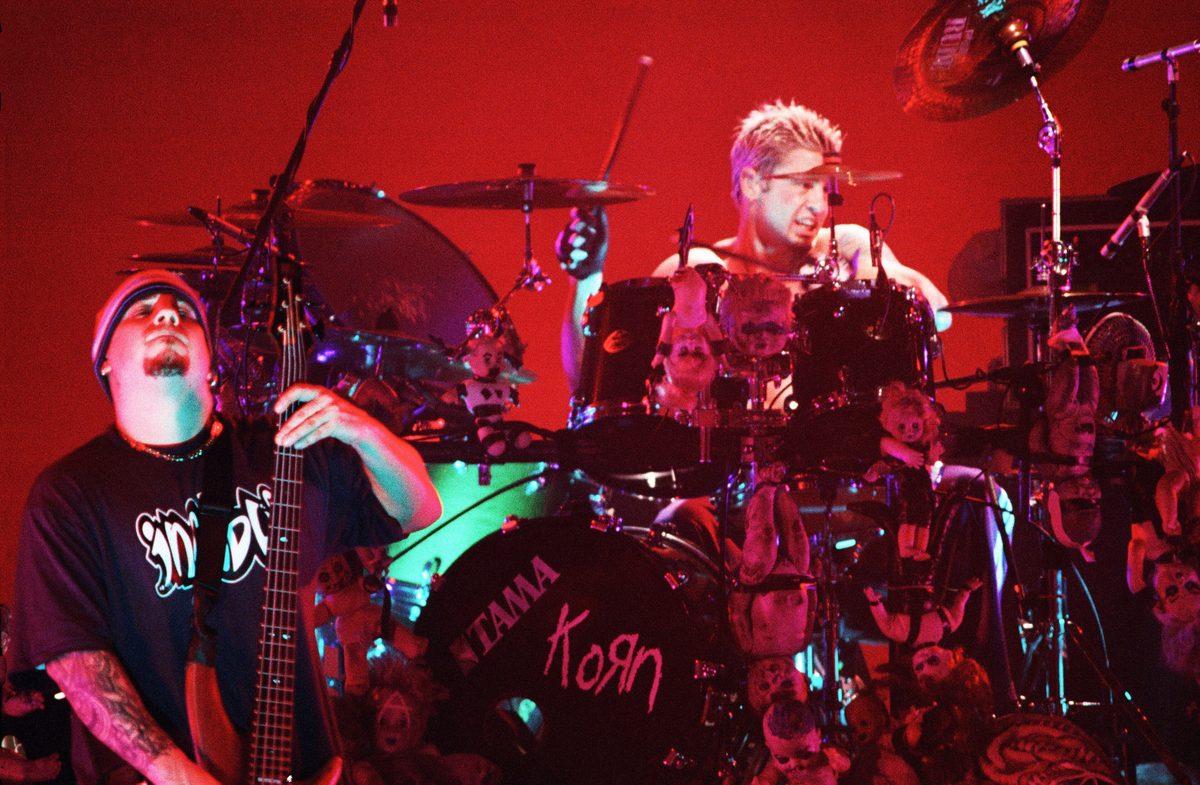 Reginald "Fieldy" Arvizu on his 5-string bass and David Silveria on drums at the Brixton Academy, London, on 24 February 1997.