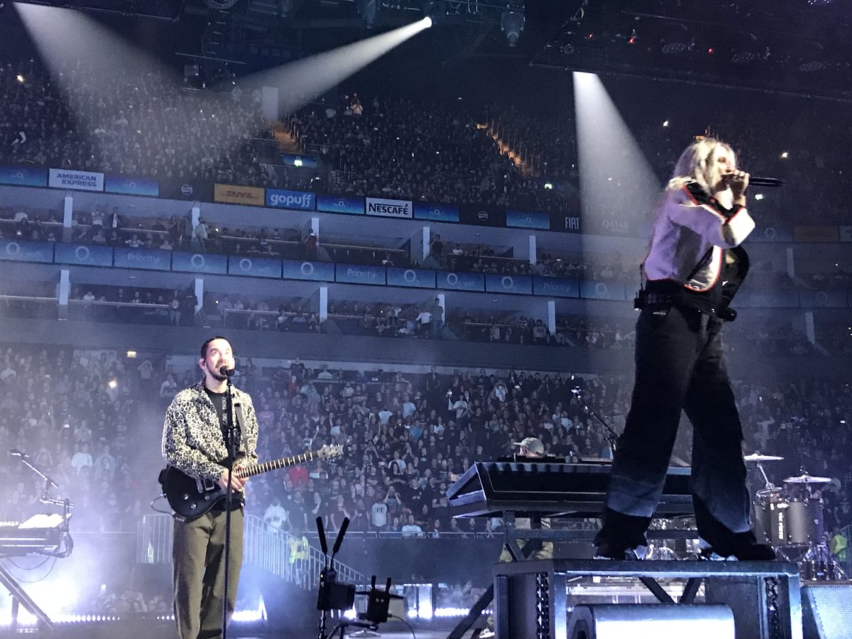 Mike Shinoda on guitar and Emily Armstrong at the O2 Arena in London on the From Zero tour, 24 September 2024.