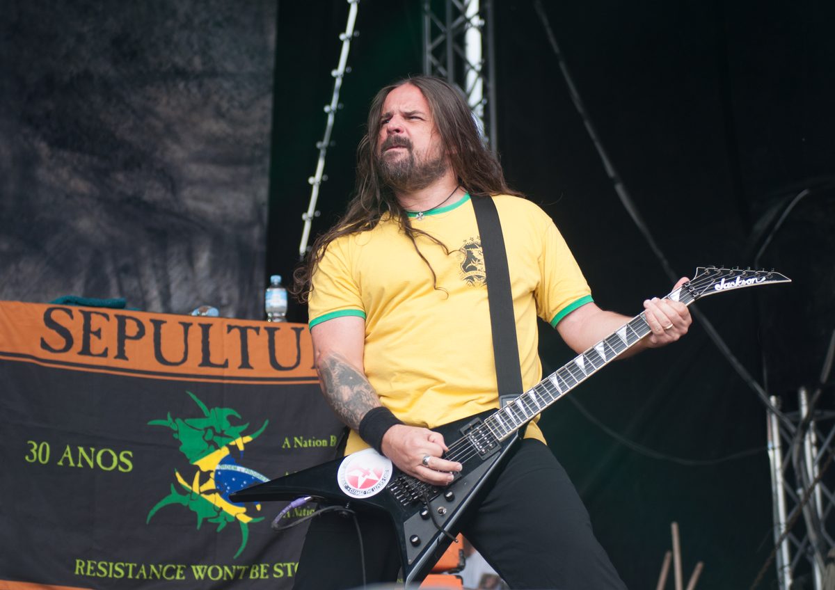 Andreas Kisser with his Jackson guitar in front of a Sepultura 30th-anniversary banner at Vainstream Rockfest, Münster, Germany, 5 July 2014.