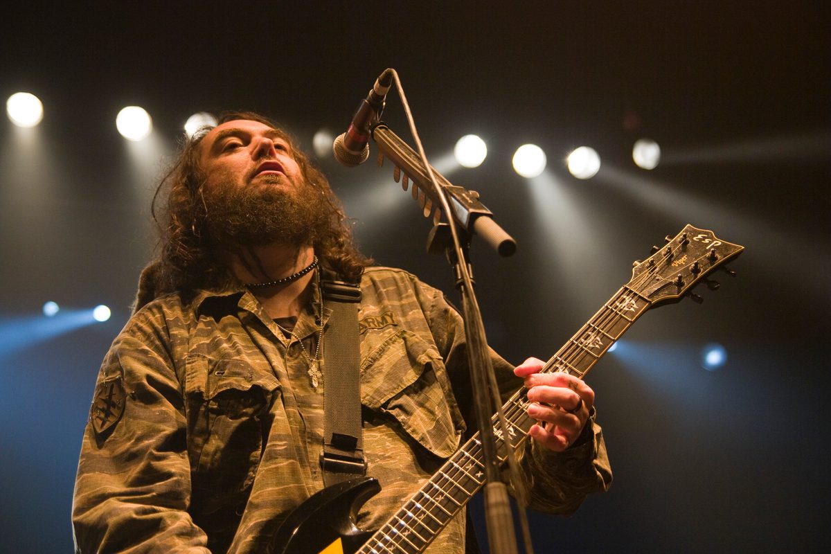 Sepultura co-founder Max Cavalera playing guitar with Cavalera Conspiracy, 2011.