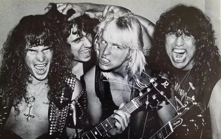 Slayer's original line-up of Tom Araya, Jeff Hanneman, Kerry King and Dave Lombardo in a 1983 Metal Blade Records press photo.