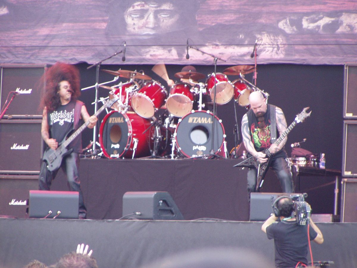 Tom Araya on bass and Kerry King with his V-shaped guitar at the Heineken Jammin' Festival, Italy, 14 June 2007.