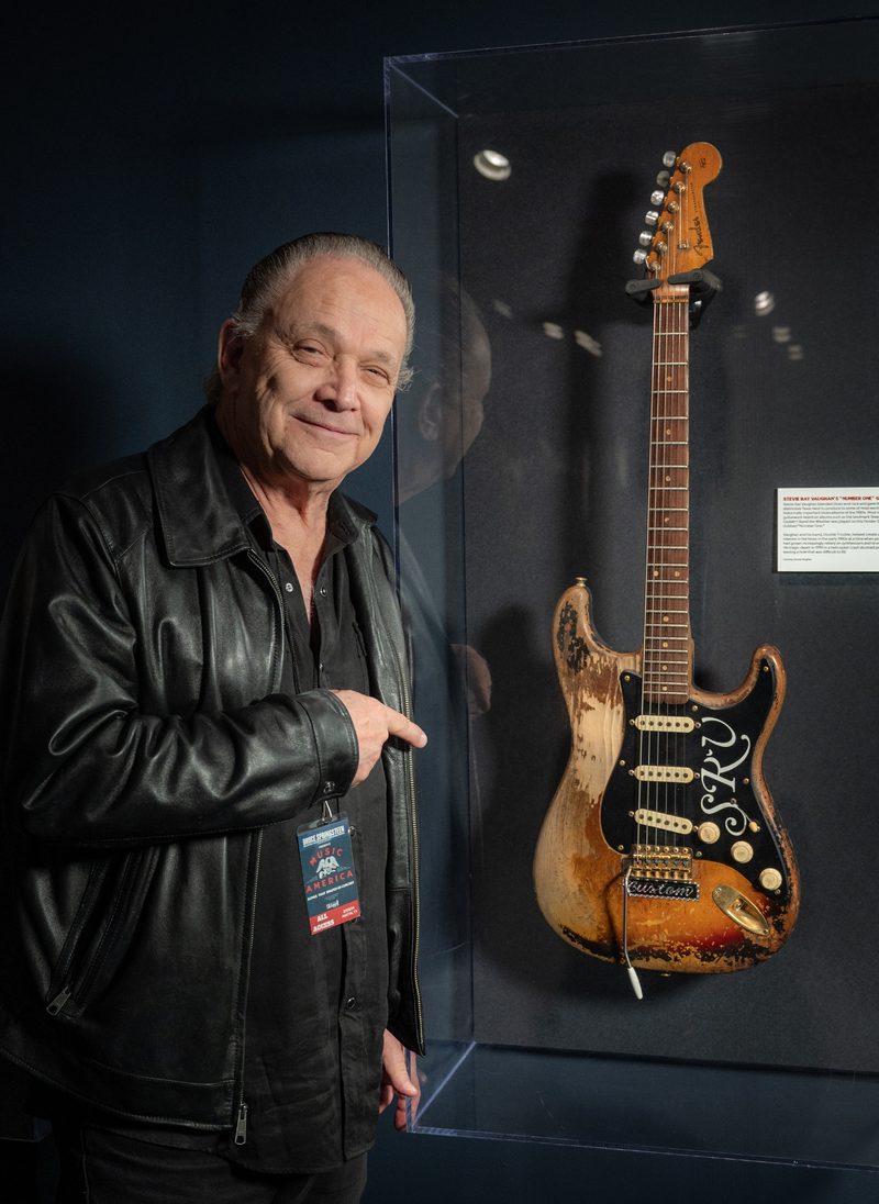 Jimmie Vaughan beside his brother's Stratocaster, Number One, in the Music America exhibit at the LBJ Library in Austin, Texas, on 15 February 2024.