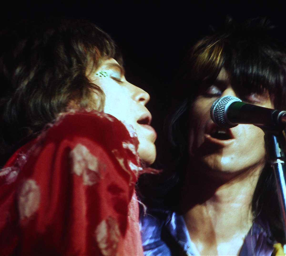 Mick Jagger and Keith Richards singing side by side at Winterland, San Francisco, during the Rolling Stones' North American tour of June 1972.